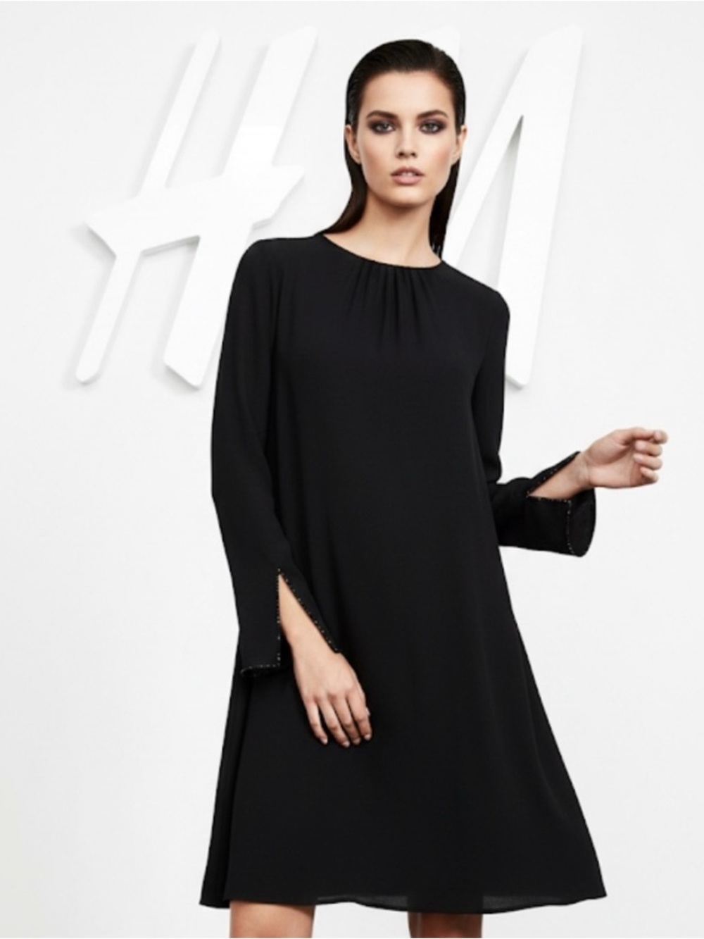 Authentic H&M black designer dress with embellished sleeves sz 10